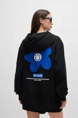 Cotton-terry all-gender hoodie with flower-print logos