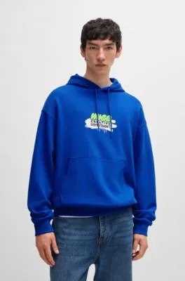 Cotton-terry hoodie with spray-paint graphic